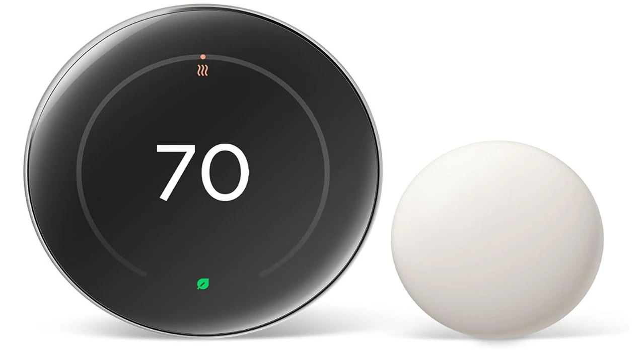 A front view of the Google Nest Learning Thermostat 4th Gen with its stainless steel bezel, showing the temperature on its bright, circular digital display.
