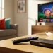 Roku Ultra streaming device on a coffee table representing cord cutting with Roku.