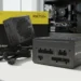 Corsair RM750e showing modular ports and yellow retail packaging.