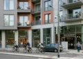 Modern 15 minute city control block with bike lanes and hidden traffic camera